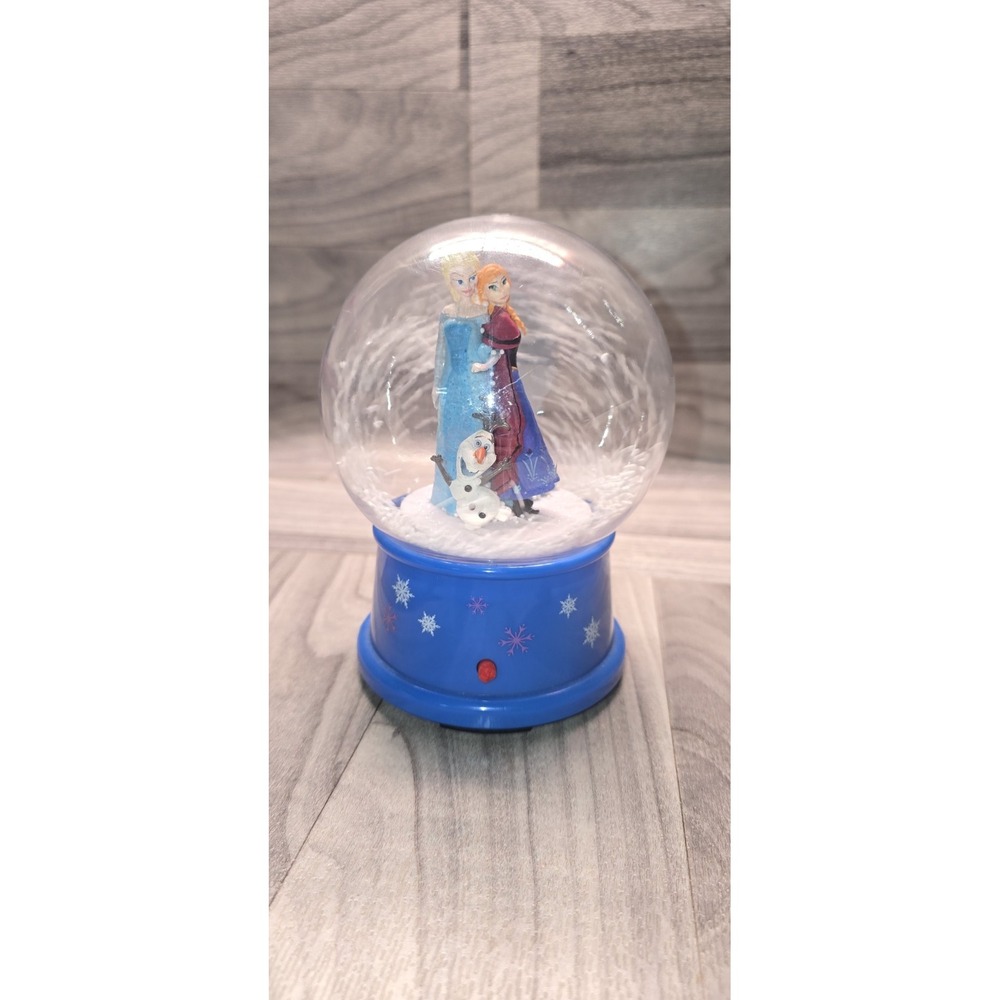 Disney Frozen musical snowglobe featuring Anna, Elsa, and Olaf. #10